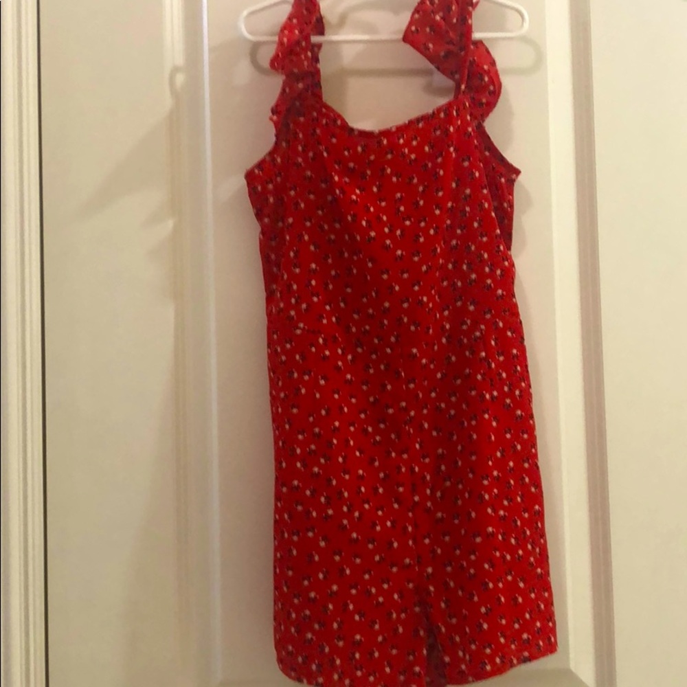 Red modern jumper with white flowers